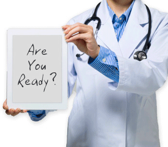 A doctor holding a sign that asks "Are you ready?"