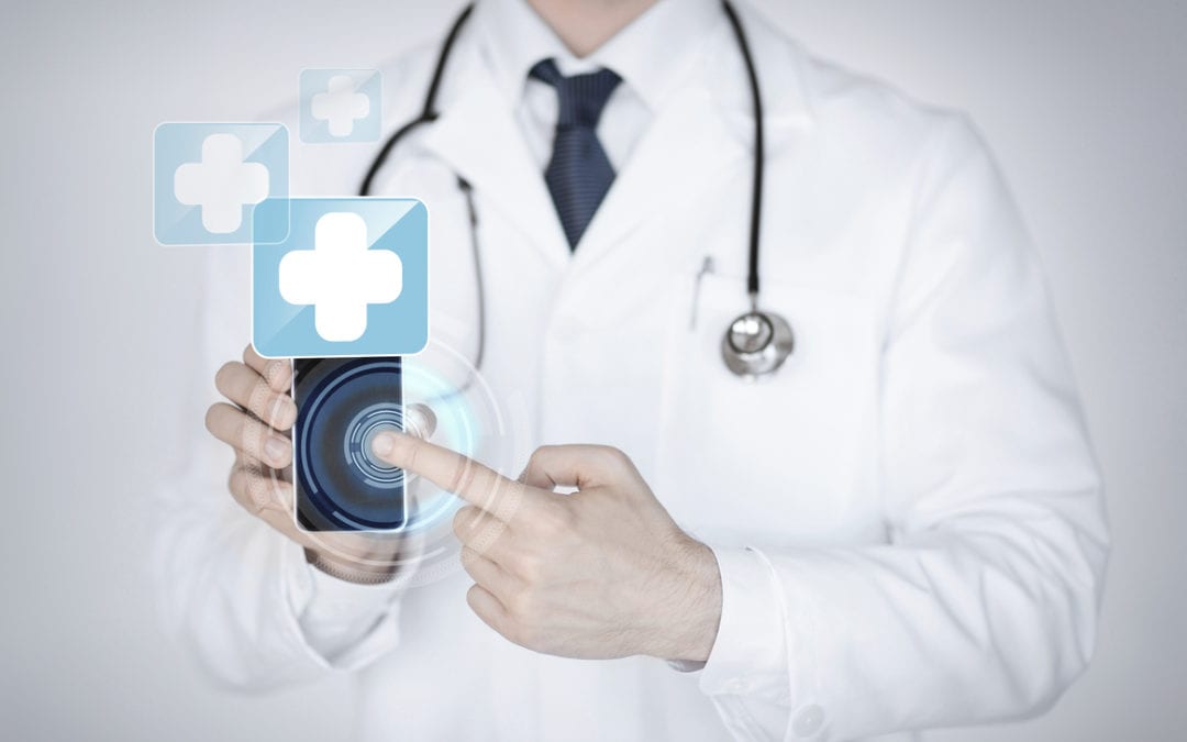 close up of male doctor holding smartphone with medical app