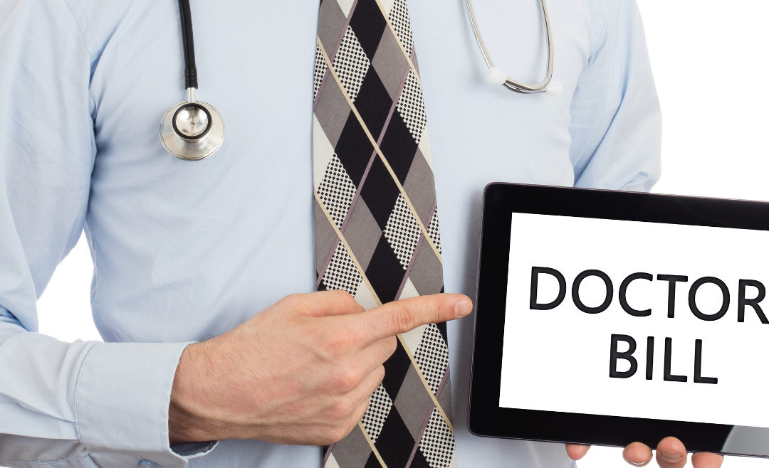 Person holding a tablet that says Doctors Bill